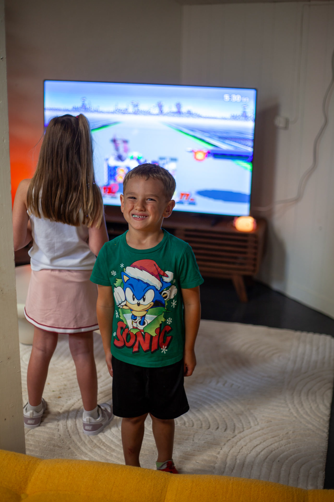 Kids enjoying the play area and video games inside Nine99