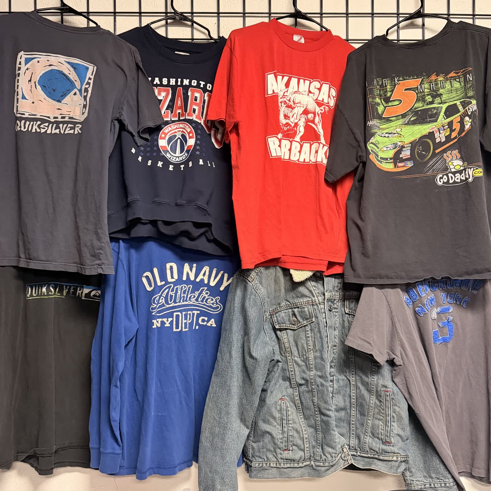 Fresh drop of vintage graphic tees on the wall at Nine99
